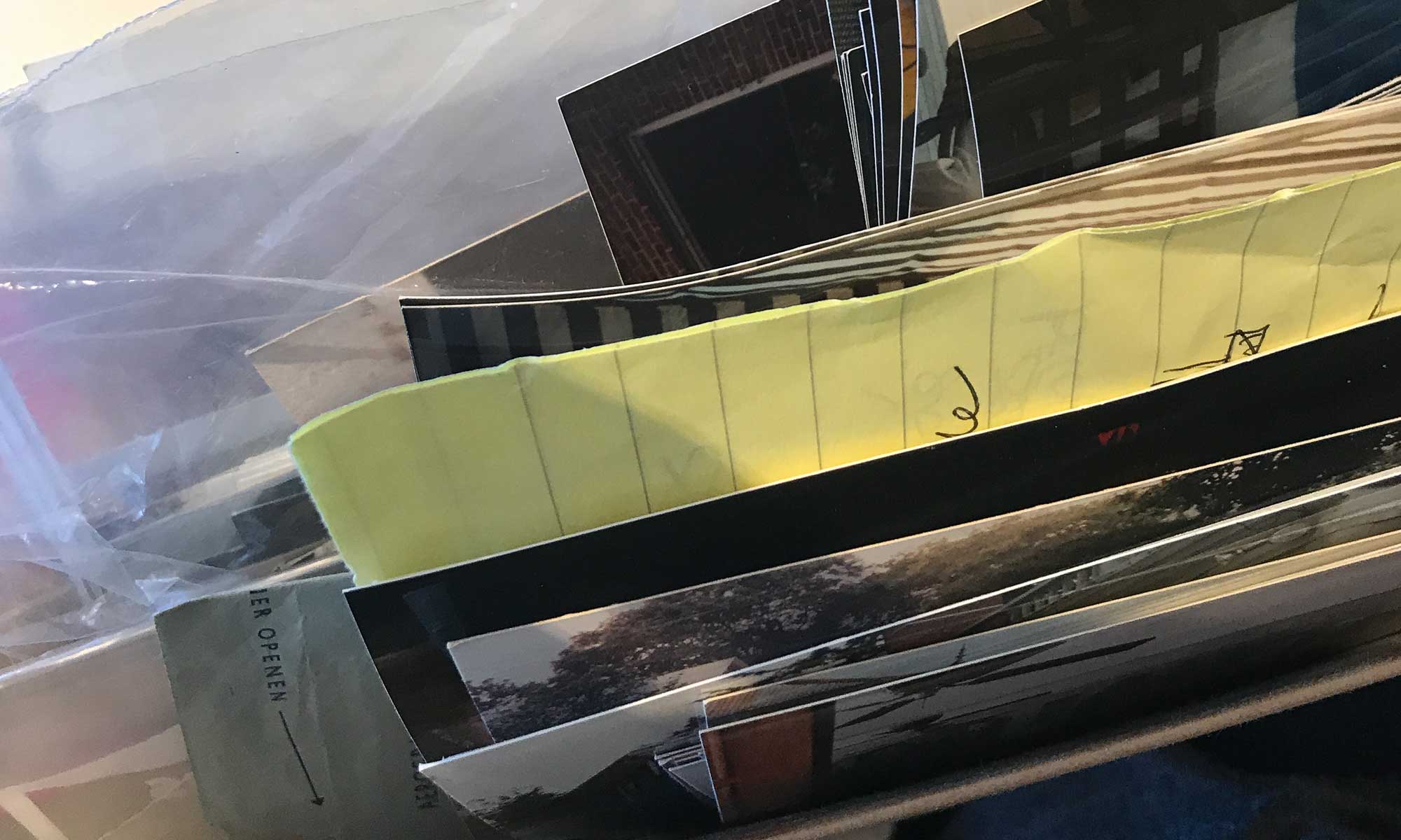 Scanning and digitizing-close up stack of photos and papers