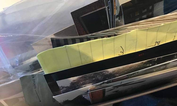 Scanning and digitizing-close up stack of photos and papers